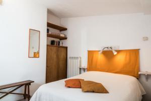 Postel nebo postele na pokoji v ubytování B&b Cinque Stalle