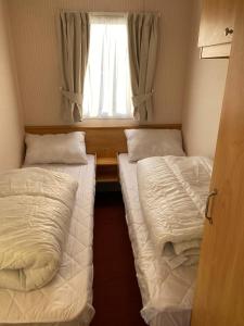 Postel nebo postele na pokoji v ubytování Golden sands caravan skegness ingoldmells 6 berth