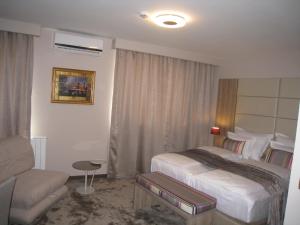 Letto o letti in una camera di Hotel VIP