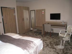 Letto o letti in una camera di Hotel VIP