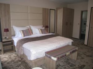 Letto o letti in una camera di Hotel VIP