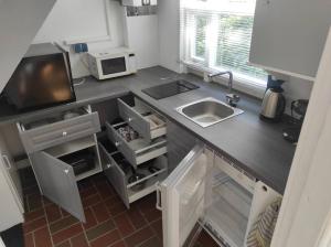Kuchyň nebo kuchyňský kout v ubytování Ferienhaus Bieberhöhe