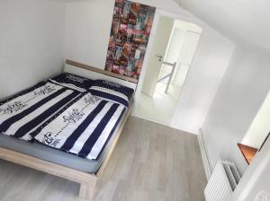 Postel nebo postele na pokoji v ubytování Ferienhaus Bieberhöhe