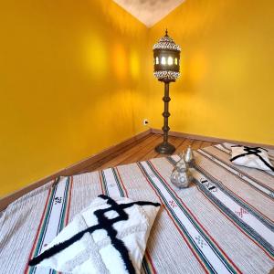 Postel nebo postele na pokoji v ubytování Gîte Le Garage - LOUVRE BOLLAERT