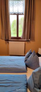 Letto o letti in una camera di motorest U KONĚ
