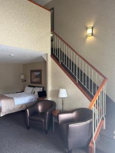 Postel nebo postele na pokoji v ubytování Lakeview Inns & Suites - Hinton