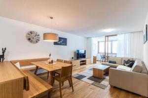 TV a/nebo společenská místnost v ubytování Faschina Apartment - Top 4