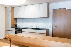 Kuchyň nebo kuchyňský kout v ubytování Faschina Apartment - Top 4