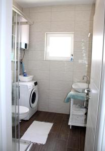 Ванная комната в Apartman Maslina