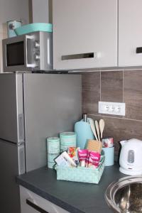 Кухня или мини-кухня в Apartman Maslina
