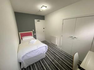 Postel nebo postele na pokoji v ubytování Aaran Central Guesthouse