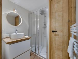 a bathroom with a sink and a shower at Appartement Montvalezan-La Rosière, 5 pièces, 10 personnes - FR-1-690-19 in Montvalezan