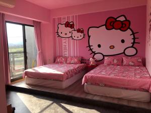 Postel nebo postele na pokoji v ubytování Ching Yu Rou B&B