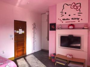 TV a/nebo společenská místnost v ubytování Ching Yu Rou B&B