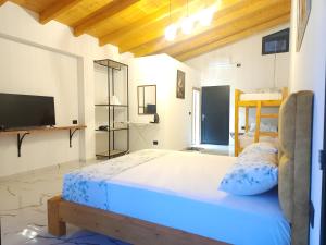 Katil atau katil-katil dalam bilik di Hotel Panorama Piqeras