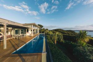 an aerial view of a house with a swimming pool at Eagles Nest in Russell