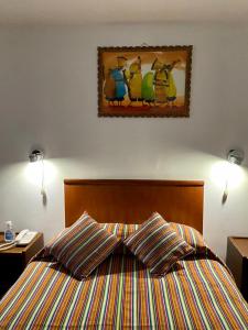 Rúm í herbergi á Saphi Inn Cusco - Excelente ubicación