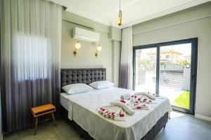 Postel nebo postele na pokoji v ubytování Dalyan Villa Alba + 28 fotografií