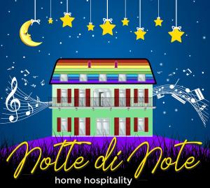 uma casa com notas musicais e estrelas na noite em Notte di Note - home hospitality em Busto Arsizio