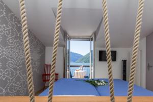 Letto o letti in una camera di Hotel Riviera