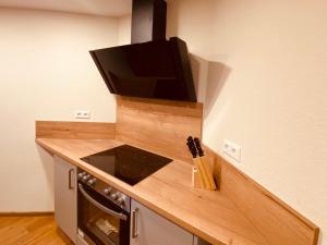 Kuchyň nebo kuchyňský kout v ubytování Azuria Schwarzwald Loft