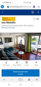 a website of a living room with a couch and a table at I am envigado. in Envigado