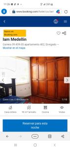 a page of a website with a wooden cabinet at I am envigado. in Envigado