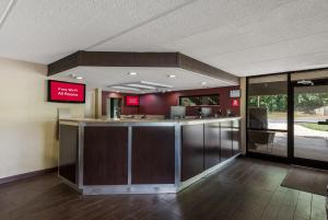 a lobby with a bar in a building at Red Roof Inn Hickory in Hickory