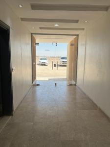 an empty hallway with a view of a parking lot at شقق مفروشة in Riyadh