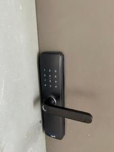 a black door handle on a door at شقق مفروشة in Riyadh