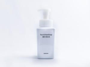 a white bottle of moisturizing moisturizing fluid next to a white bottle oficating at APA Hotel Kayabacho Hachobori Ekimae in Tokyo