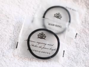 a pair of wedding rings sitting on top of a envelope at APA Hotel Kayabacho Hachobori Ekimae in Tokyo