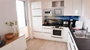 Η κουζίνα ή μικρή κουζίνα στο Ferienwohnung Seaside +5 φωτογραφίες