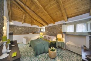 En eller flere senge i et værelse på Residenza Matarazzo e Le Sue Soffitte
