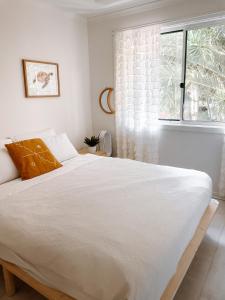 Letto o letti in una camera di Cosy Home Byron Bay