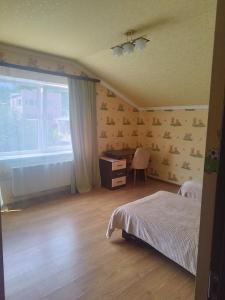 Letto o letti in una camera di Комнаты у Айрин