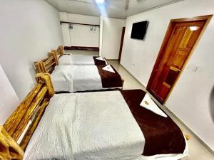 Hotel la Union客房内的一张或多张床位