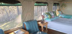 Postel nebo postele na pokoji v ubytování Trees&Seas - Getaway Glamping