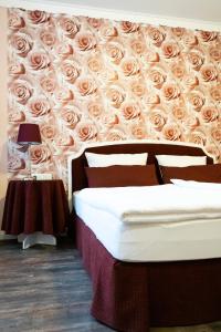 Postel nebo postele na pokoji v ubytování Rein Klassik Hotel