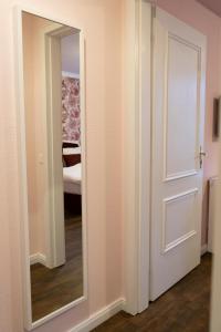 Postel nebo postele na pokoji v ubytování Rein Klassik Hotel