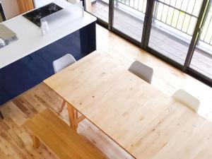 an overhead view of a wooden table and chairs at Kino-saji - Vacation STAY 89208 in Ibusuki