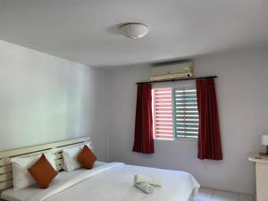 Letto o letti in una camera di The 4 Blocks at Kata noi