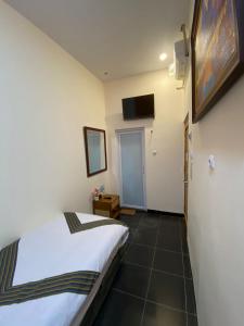 Letto o letti in una camera di The Cabin Hotel Mantrijeron