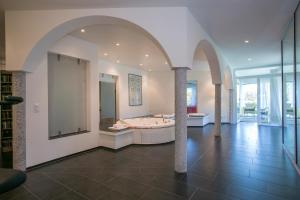 a large bathroom with a tub and a shower at Villa Blu Ortensia - Happy Rentals in Pura