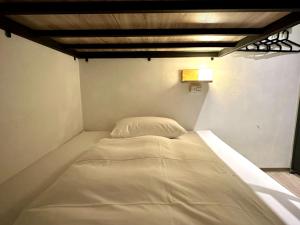 Postel nebo postele na pokoji v ubytování Taipei Sunny Hostel