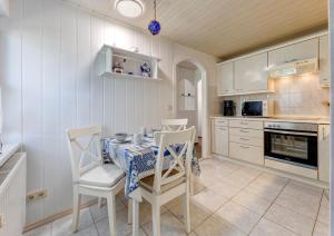 Η κουζίνα ή μικρή κουζίνα στο Ferienhaus Roland +15 φωτογραφίες