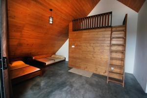 Postel nebo postele na pokoji v ubytování Shalom Bungalow
