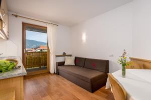 A seating area at Ferienwohnung Mair am Bach