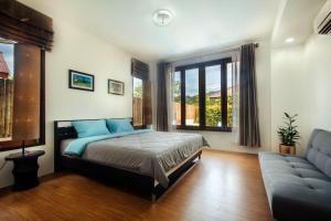 Postel nebo postele na pokoji v ubytování Villa SEAesta