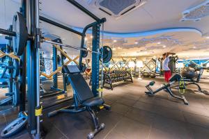 a gym with cardio equipment in a room at Zen-Inspired Duplex Luxury 6Pax, Arte Mont Kiara by Verano in Kuala Lumpur